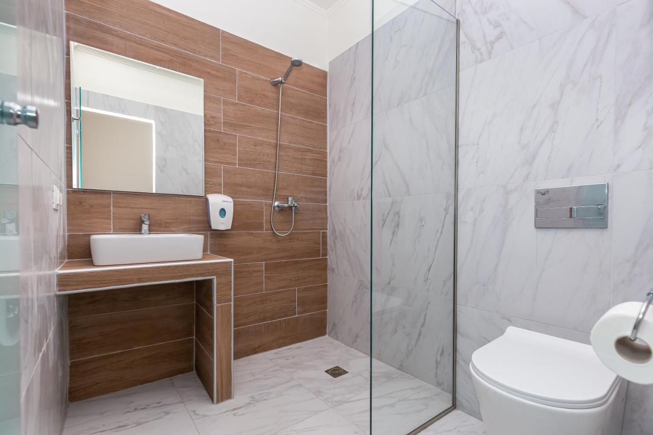 Aqua Luxury Suites By Estia Рода Экстерьер фото