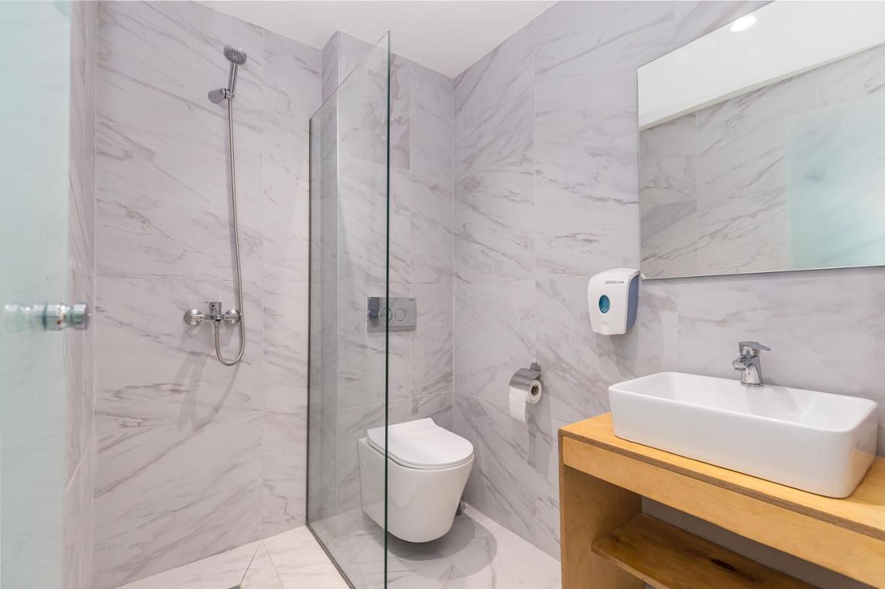 Aqua Luxury Suites By Estia Рода Экстерьер фото